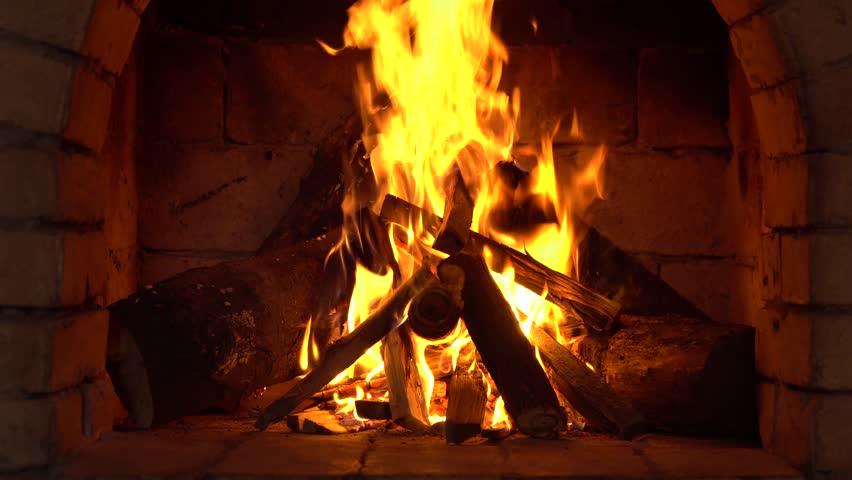 A fire burns in a fireplace, Fire to keep warm | Shutterstock HD Video #34970197