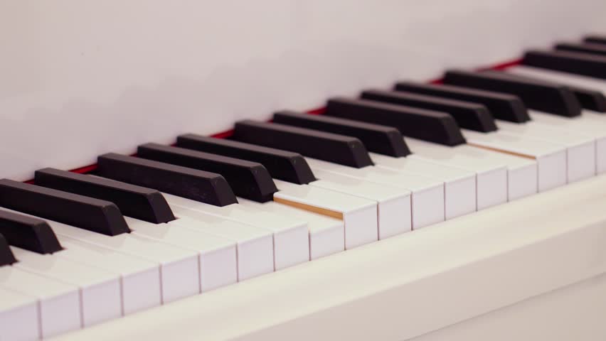 Automatic production of melody by robot, computer artificial intelligence piano keyboard pianist to rehearse before the classical, performance in celebration of the great success. - Powered by Shutterstock - Get 15% off with code: PIKWIZARD15