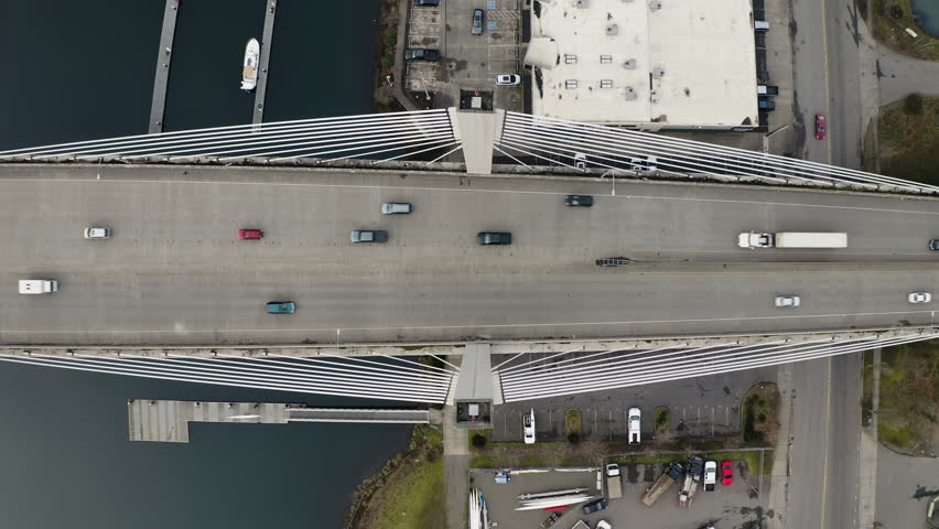 Traffic At East 21st Street Bridge Over Thea Foss Waterway In Tacoma, Washington. - aerial static shot