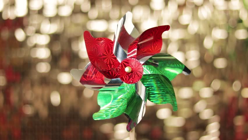Pinwheel Spinning with Golden shimmer wall Backdrop. Cinco de Mayo Celebrations