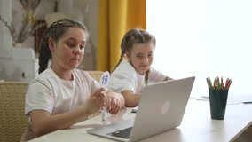 Interactive learning at home on laptop. children with laptops participate in educational activities at home. Young students use new technology and study laptops for modern education. child dream. - Powered by Shutterstock - Get 15% off with code: PIKWIZARD15