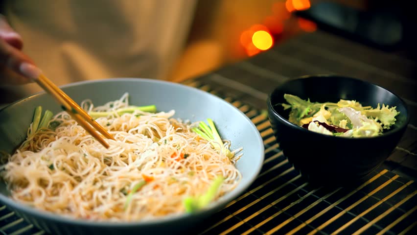 Instant Rice Noodles Bowl. Chinese Ramen Soup. Cooked Rice Instant Glass Noodles Ramyeon Bowl. Asian Dinner Cooking. Quick Ramen Dry Vegetables. Chinese Food. Korean Ramyeon Bowl Glass Noodles 