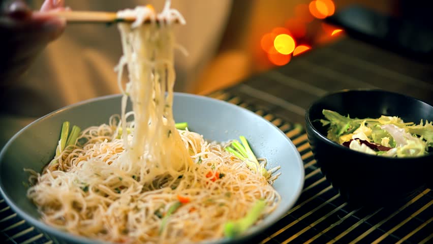 Instant Rice Noodles Bowl. Chinese Ramen Soup. Cooked Rice Instant Glass Noodles Ramyeon Bowl. Asian Dinner Cooking. Quick Ramen Dry Vegetables. Chinese Food. Korean Ramyeon Bowl Glass Noodles 