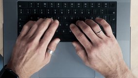 Adult Hands of Business Man Typing on Keyboard of Laptop Computer in Office Workspace. Executive Businessman or Company Blogger Focusing on Commerce Work Uses Notebook Indoor. User of Hacker Gadget - Powered by Shutterstock - Get 15% off with code: PIKWIZARD15