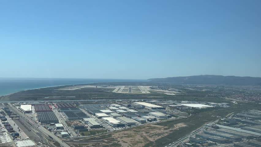 POV immersive pilot perspective of Barcelona airport in Spain, shot from a jet approaching to the airport. Sunny bright morning. 4K 60FPS