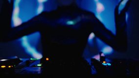 Energy And Rhythm Of Music, Slender Lady DJ Dancing And Mixing Tracks In Nightclub, Slow Motion - Powered by Shutterstock - Get 15% off with code: PIKWIZARD15