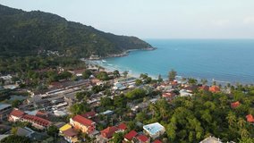 Famous full moon party beach at sunset - aerial drone shot - Powered by Shutterstock - Get 15% off with code: PIKWIZARD15