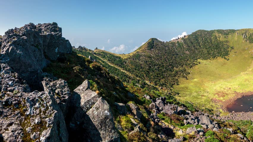 Jejudo, panoramic view of volcano crater and lake at the summit of Hallasan, South Korea tallest peak, on Jeju island