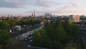 Aerial View Shot of London UK, United Kingdom, magical light, sunrise, London Skyline, City of London, Shard