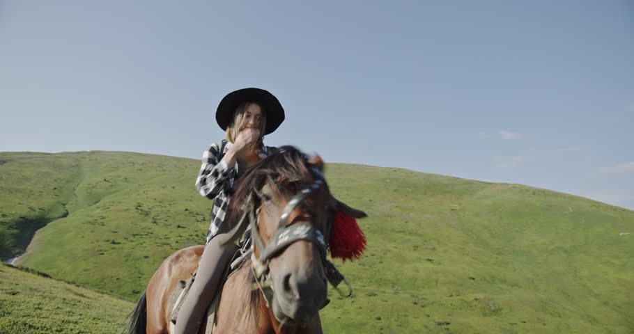 Serene Moments: Young Woman and Horse in Mountainous Landscape