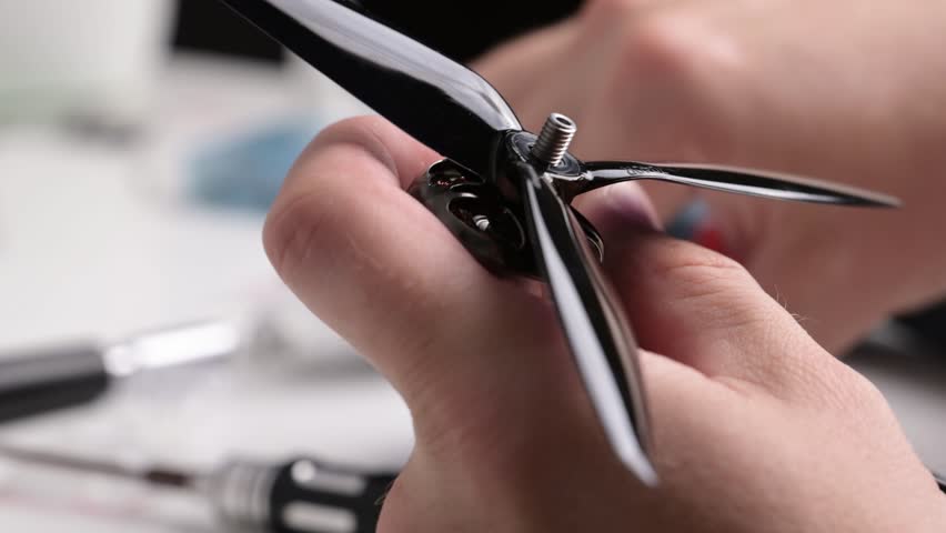 Assembling Fpv Diy Drone. Attaching A Copter Propeller And Tightening Propeller Nut