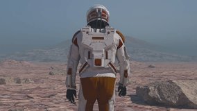 Astronaut wearing space suit walking on the surface of mars. Exploring mission to mars. Red Planet Covered in Gas and Smoke. Futuristic colonization and space exploration concept. - Powered by Shutterstock - Get 15% off with code: PIKWIZARD15