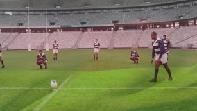 Animation of flag of germany over afrcain american male rugby kicking ball on pitch during match. German, nationality, team, match, sport and competition, digitally generated video. - Powered by Shutterstock - Get 15% off with code: PIKWIZARD15