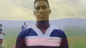 Animation of flag of colombia over portrait of african american rugby player on rugby pitch. Colombian, nationality, team, confidence, sport and competition, digitally generated video. - Powered by Shutterstock - Get 15% off with code: PIKWIZARD15