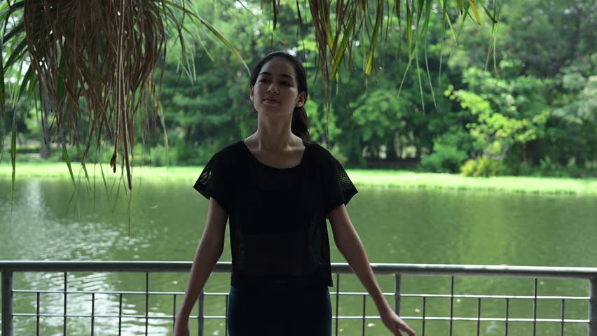 Teenage girl with holiday activities, Doing holiday morning exercise in the park.