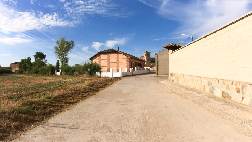 a street in Boadilla del Camino with a view to the church, province of Palencia, Castile and Leon, Spain