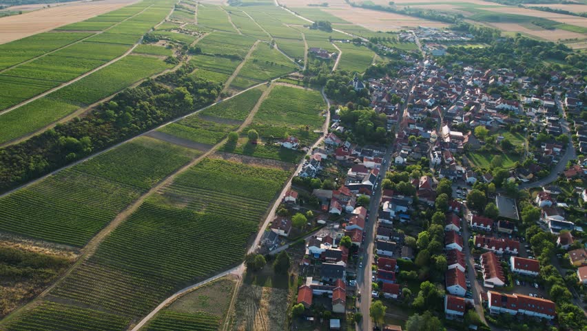 Aerial around the old town of the city Essenheim in Germany on a sunny spring day 
