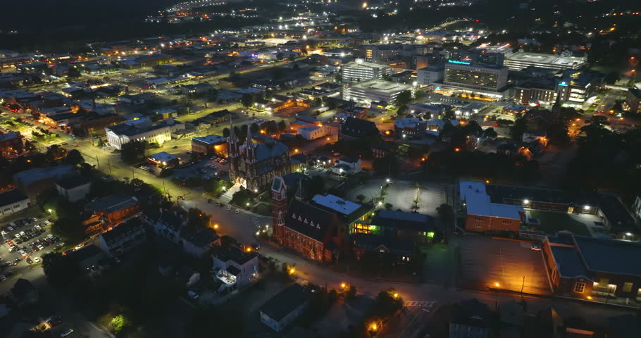 Aerial view of Macon, historic city in central Georgia with old historical architecture. USA panoramic cityscape at night
