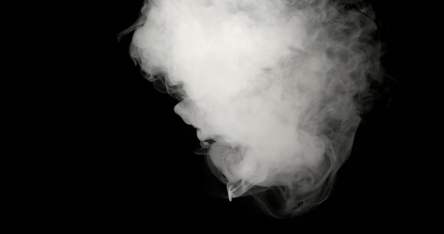 A plume of smoke billows from the top of a black background, forming a fluffy smoke cloud. Its swirling form and movement are highlighted by bright light