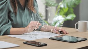 fashion designers in studio drawing dress on virtual graphic tablet,creative dressmaker at the desk draws sketch of stylish outfit using new digital technology - Powered by Shutterstock - Get 15% off with code: PIKWIZARD15