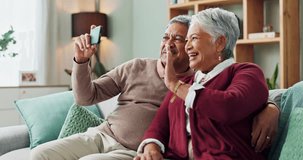 Senior couple, happy and smartphone for video call, contact and communication in living room. People, mature man and woman on sofa, couch and house together with cellphone for online conversation