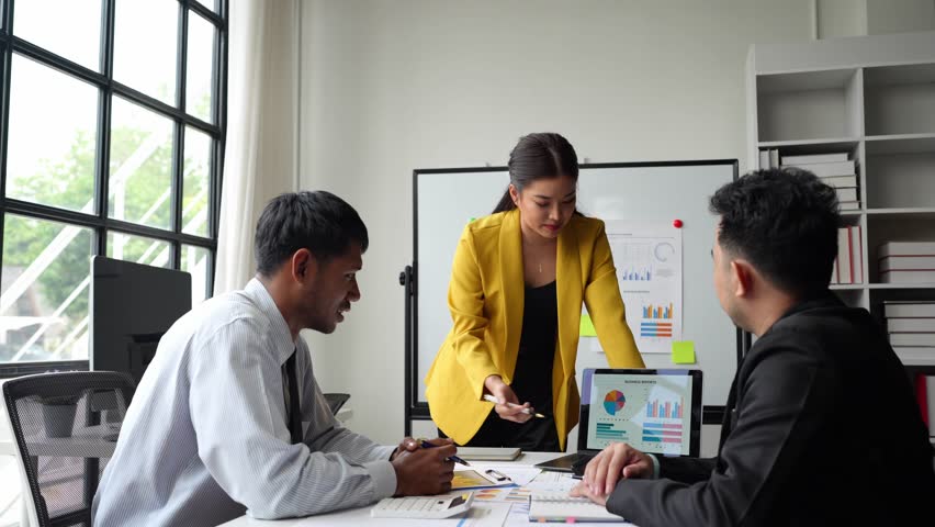 Financial analyst team report Business finance presentation on laptop during discussion at company meeting showing results of successful teamwork, real estate business meeting concept, marketing.
