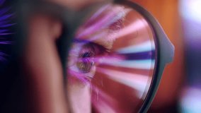 Eyes of Man in Glasses Looking at Computer Screen with Glowing Video of Internet Simulation. Concentrated Sight of Addictive Person Spending Time Online and Staring at Moving Image. Macro Shot View 4k - Powered by Shutterstock - Get 15% off with code: PIKWIZARD15