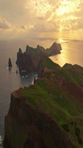 Incredibly beautiful view from a drone of the island of Madeira, located in the Atlantic Ocean. Aerial shot of a green, fresh, prosperous island. Popular tourist destination for Europeans