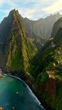 Incredibly beautiful view from a drone of the island of Madeira, located in the Atlantic Ocean. Aerial shot of a green, fresh, prosperous island. Popular tourist destination for Europeans