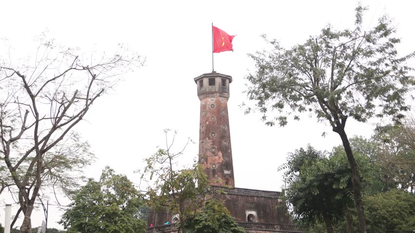 vietnamese flag on top of hanoi tower in the citadel in Hanoi the capital city of Vietnam in Southeast Asia