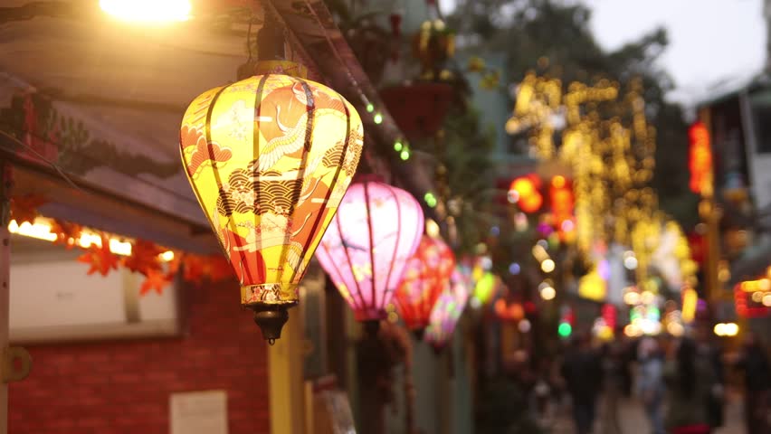lanterns lit at night on train street in Hanoi the capital city of Vietnam in Southeast Asia