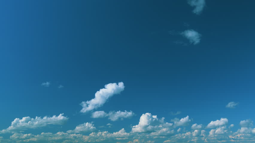 Blue Sky Background With Tiny Clouds. White Clouds In Blue Clean Bright Sky. Blue Sky And White Fluffy Clouds.