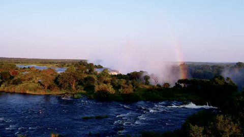 Incredible aerial view of the Victoria falls and a rainbow