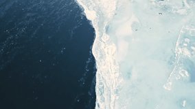 aerial view of froze ice glacier melting in artic drone fly close to glacier melting causing rising sea level global warming climate change concept - Powered by Shutterstock - Get 15% off with code: PIKWIZARD15