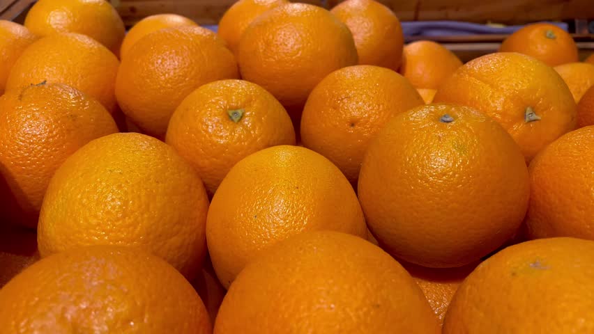 a lot of fruits. market. store. background. citruses. healthy food. natural. food. health. Vegeterian. diet. Orange fruit. Top view