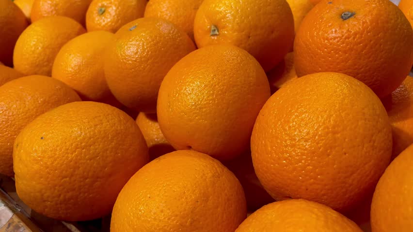 a lot of fruits. market. store. background. citruses. healthy food. natural. food. health. Vegeterian. diet. Orange fruit. Top view