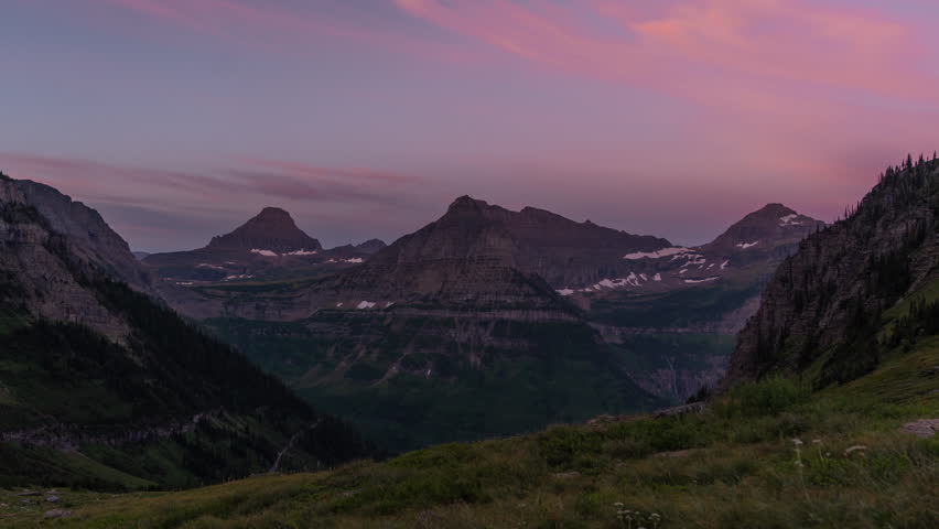 Timelapse, Sunrise Above Peaks of Glacier National Park, Montana USA on Summer Season