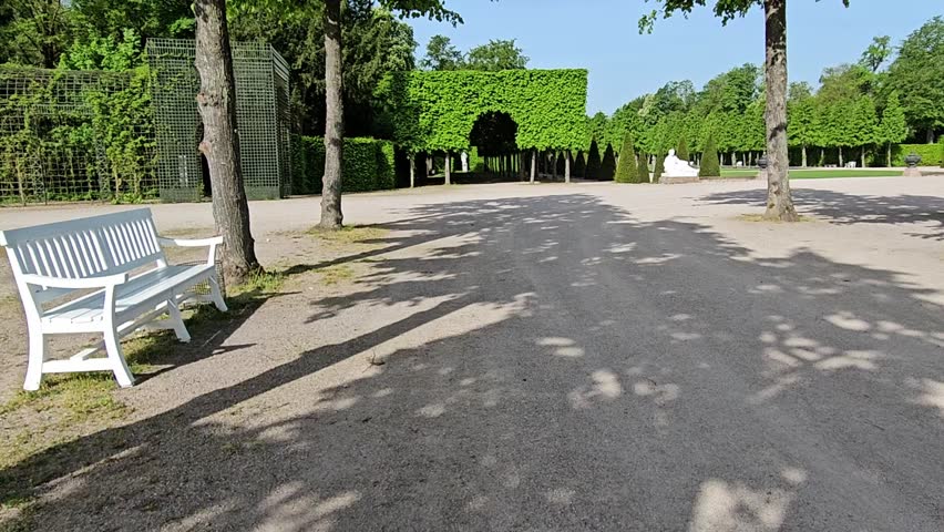 Walking shot in outdoor garden on castle ground, Germany