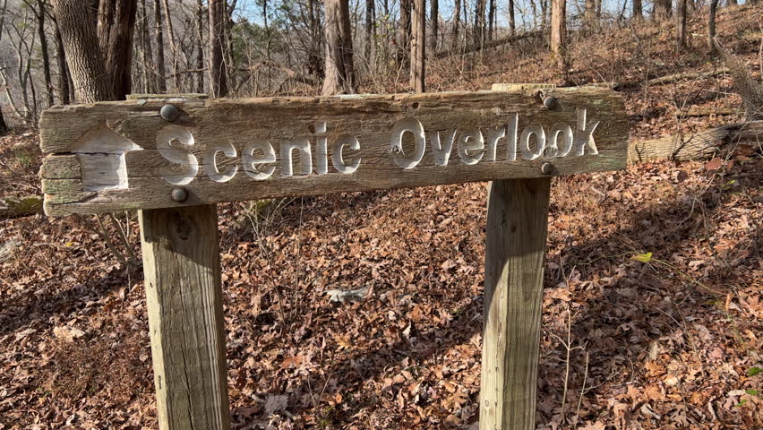 Scenic Overlook sign on hike path in forest 4k