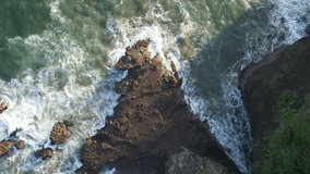 Magical Hidden Rocky Beach at Sunset. Drone Footage