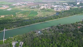 Aerial drone footage of the rowing canal in Plovdiv. Sports facility for rowing in the heart of the recreation and culture park in the second largest city of Bulgaria. Boat racing venue. flyover - Powered by Shutterstock - Get 15% off with code: PIKWIZARD15
