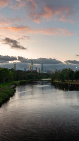 Vertical 4k Timelapse, Melbourne Australia Cityscape Skyline View From Botanical Garden Over Lake