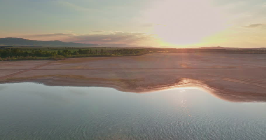 Panoramic view of the sunset and the beautiful natural area around the lake