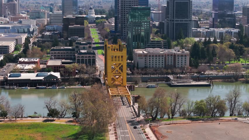 Slow panning drone aerial shot of the Tower Bridge in Sacramento, California