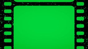 Green screen loop footage of old negative film strip frame. Slow animated from down to up vertically with old movie effect on it. Good to use in your videos and projects. Chroma key background.