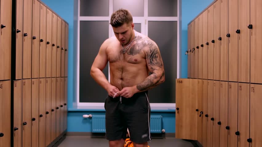 Video Stok tattooed man dresses gym's locker room (100% Tanpa Roya...