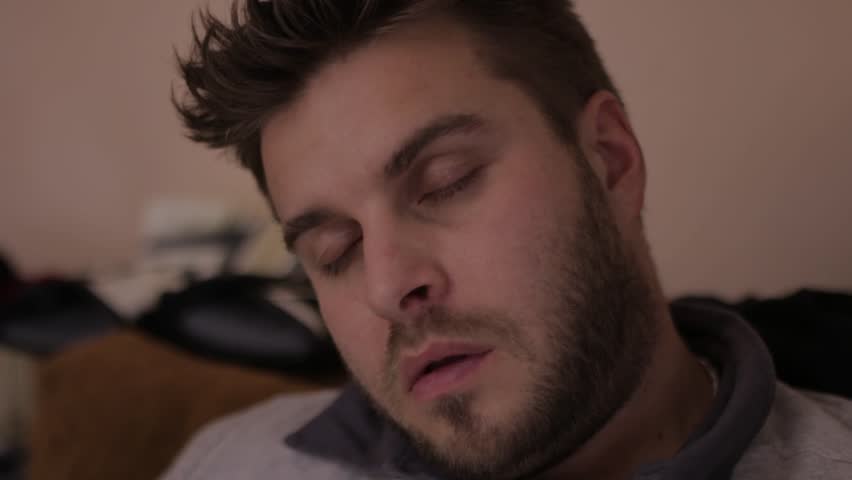 Bearded man sleeping sitting and wakeup | Shutterstock HD Video #35003944