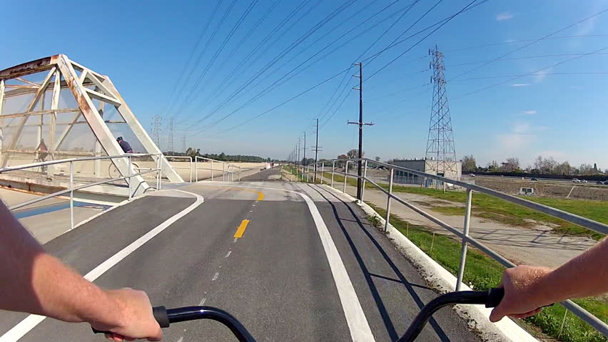 LONG BEACH, CA - February 23, 2013: The POV of someone riding a bicycle across a