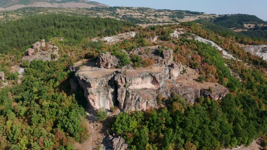 Harman Kaya Thracian Megalithic Site On Mountains Of Rhodope In Bulgaria. aerial orbiting shot