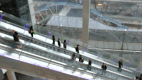 People walking on the escalator 12